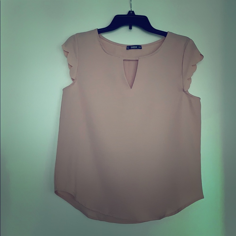 Pink blouse.